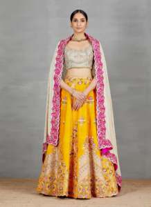 women lehengas, bridal designer lehenga, designer lehenga, bridal lehenga collections, Yellow Raw Silk Lehenga, bollywood lehenga collection, new bridal lehenga designs NIDHI THOLIA